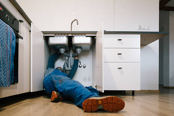 Professional Drain Cleaning technician working in Lakeland, MI